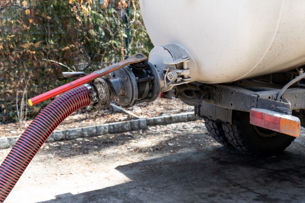 Tanker pumping out sewage